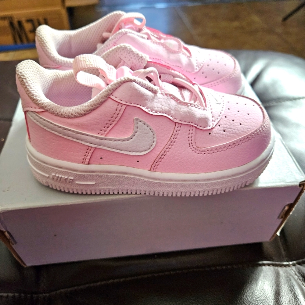 Pink and white Nike Air Force 1, Size 7 infant